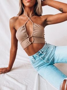 DETAILS: Our Mailey Criss Cross Halter top is a ribbed fitted crop top. This crop has a self tie cross halter tie. The front of this top has a two key hole detail. The front vcan be synched with the self tie to make the hole smaller or bigger. The back is an open back. CONTENT & CARE: SELF: 85% Rayon, 15% Spandex. SIZE & FIT: Model is 5'9" The model is wearing a size Small . Fits true to size The Fabric has stretch Cross Halter Top, Criss Cross Halter Top, Fitted Crop Top, Custom Jacket, Key Hole, Pop Up Shop, Two Pieces, Halter Top, Summer Style