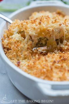 a casserole dish with broccoli and cheese