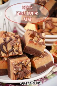 several pieces of peanut butter fudge on a plate with the words reese's peanut butter fudge above it