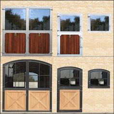 an old brick building with wooden doors and windows