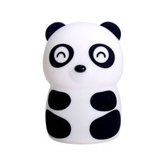 a white and black panda bear toy with big eyes on it's face,