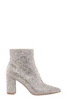 Instantly elevate any outfit with these fabulous pointy toe booties covered in a symphony of glittering crystals. 3 1/5" heel 5 1/5" shaft height Side zip closure Rhinestone and textile upper/textile lining/synthetic sole Imported Sparkling High Heel Evening Boots, Glamorous Embellished Ankle Boots, Elegant Sparkling Boots For Fall, Glamorous Embellished Boots For Formal Occasions, Glamorous High Heel Boots With Glitter, Sparkling Ankle Boots For Evening, Glamorous Embellished Heeled Boots With Pointed Toe, Glamorous Embellished Ankle Boot Heels, Rhinestone Heels For Formal Fall Events