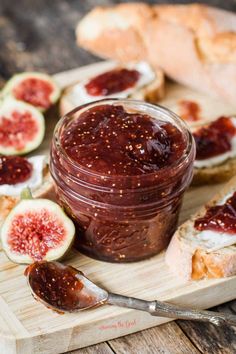 figs and bread on a cutting board with jam