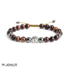 This men’s bracelet with red tiger eye and hematite beads features an engravable circle charm. It is designed with an adjustable sliding knot for comfort and ease. Personalize with an initial for a special touch. Cord Bracelet Diy, Adjustable Sliding Knot, Homemade Bracelets, Bracelets Handmade Diy, Red Tiger, Diy Friendship Bracelets Patterns, Beaded Jewels, Bohemian Bracelets, Homemade Jewelry