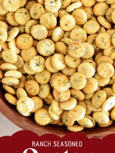 a wooden bowl filled with ranch seasoned crackers