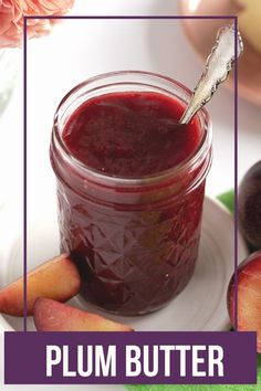 plum butter in a glass jar on a plate