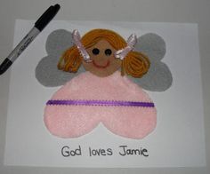 a card with an angel on it and the words god loves jamie