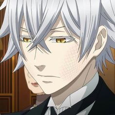 an anime character with white hair and yellow eyes looking at the camera while wearing a suit