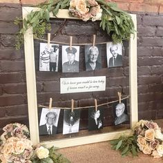 an old photo frame is decorated with flowers and greenery to hang on the wall