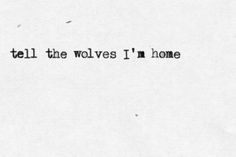 the words tell the wolfes i'm home written in black ink on white paper