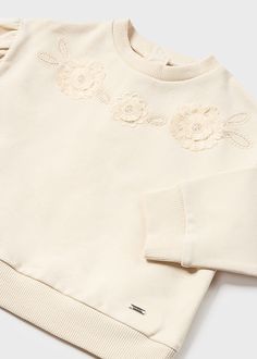 This Beige Embroidered Floral Pullover is perfect for cooler summer nights. Made with soft cotton, it features a playful yet elegant embroidered floral design that adds a touch of whimsy to any outfit. Ideal for girls who want to stay cozy while still looking stylish. Floral Pullover, Baby Design, Appliques, Summer Fun, Floral Design, Van, Floral, Pattern