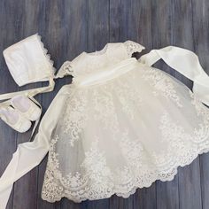 Make your baby girl's baptism unforgettable with our exquisite Christening Lace Gown. Crafted with delicate lace and designed for elegance, this beautiful baptismal gown is perfect for her special day. **Why Choose Our Baptism Dress?** - **Timeless Elegance The intricate lace detailing adds a touch of sophistication, ensuring your little one looks angelic during her christening ceremony. - **Comfort First Soft, breathable fabric guarantees comfort for your baby, allowing her to move freely while Blessing Gown, Dress For Baby Girl, Blessing Dress, Baptism Gown, Dress For Baby, Girl Christening, Baptism Dress