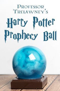 the harry potter prophecy ball is shown on a wooden table with text overlay