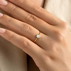 The Maren features a lustrous mother of pearl inlay on a 14k gold band. 

A contemporary yet timeless addition to any jewelry collection.

Mother of pearl inlay measures 4.7mm x 3.1mm.
 Size: 5, 6, 7, 8, 9 Modern Oval Opal Ring In Yellow Gold, Modern Oval Yellow Gold Opal Ring, Modern Yellow Gold Oval Opal Ring, Modern 14k Gold Oval Opal Ring, Modern 14k Gold Moonstone Ring, Modern 14k Yellow Gold Moonstone Ring, Modern Yellow Gold Opal Ring Gift, Modern Yellow Gold Pearl Ring For Anniversary, Modern Yellow Gold Moonstone Ring