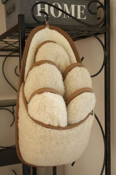 a pair of slippers hanging from a rack