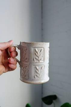 Dimensions 4.5" / 11.5cm tall 3" / 7.3 cm wide Holds 14oz / 414ml of liquid comfortably. each item is handmade, so dimensions can vary slightly! This is a taller version of my stamped mug : https://minipott.etsy.com/listing/1301764390 All my ceramic pieces are made-to-order and take 4-6 weeks production time :) I know this can seem like a long time to wait for your new piece, but remember that every made-to-order piece is made for you by me, working by myself to wedge, form, decorate, dry, bisque and glaze and fire by hand! Every single piece is unique and has it's own personality and was made special for you :) This listing is for a handmade and stamped coffee mug!  This mug is handmade by me. I made it by rolling out a slab, cutting the shapes needed to form the mug, stamping them, and t Handmade Clay Jewelry, Ceramic Pieces, Pottery Pieces, Cozy Decor, Handmade Clay, Cute Mugs, Clay Creations, Tea Mug, By Myself