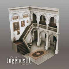 an architectural model of a building with stairs and pictures on the wall