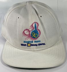 Vintage Walt Disney World Hat Cap 20th Anniversary Color: White New Era Hat Made in the USA. Hat is unworn Shipped via usps within 24 hours guaranteed! Any questions please ask! Retro White 5-panel Hat, White Fitted Retro Hat, White Fitted Vintage Top Hat, Vintage White Snapback Baseball Cap, Retro White 5-panel Snapback Hat, New Era Hat, 20th Anniversary, Hat Making, Walt Disney World