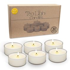 tea light candles are in front of a box