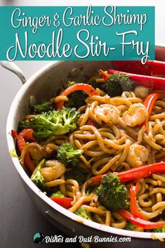 a pan filled with noodles, broccoli and shrimp