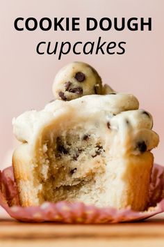 a close up of a muffin on a plate with the words cookie dough cupcakes