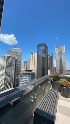 a view of the city skyline from a high rise building