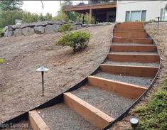 a set of wooden steps leading up to a house