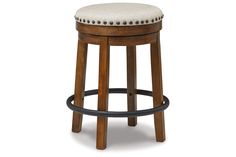 a wooden stool with a white upholstered seat and black ring around the foot rest