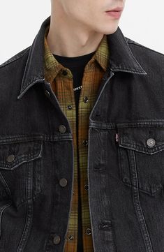 Designed to be worn for decades, this nonstretch-denim jacket is looser through the shoulders and boxier through the body than Levi's original trucker jacket. 26" length (size Medium) Spread collar Button cuffs 100% cotton Machine wash, tumble dry Imported Trucker Jacket Outfit, Levis Trucker Jacket, Denim Trucker Jacket, Trucker Jacket, Winter Outfit, Summer Shirts, The Body, Jacket Outfits, Gentleman