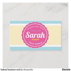 a bakery business card with a pink and blue circle on the front that says sarah bakery