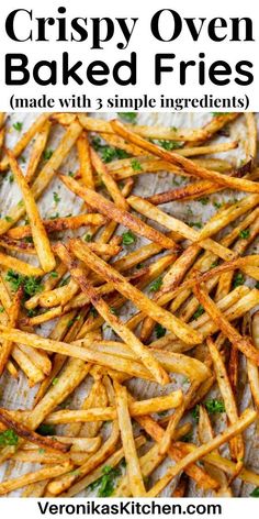 French fries, topped with chopped parsley, on the parchment paper. Homemade French Fries In Oven, Baked Bbq Chicken Thighs, Yummy Potatoes, Gravy Casserole