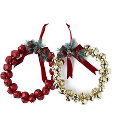 two christmas wreaths with bells and bows