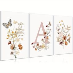 three canvases with flowers, butterflies and the letter a in pink on white background