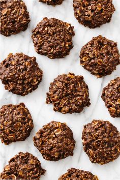 chocolate oatmeal cookies are arranged on a white marble countertop with text overlay