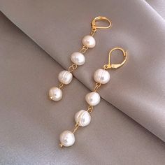 New Gold Plated Dangling Synthetic Pearl Earrings Item#Ax0000330. Pearl Long Earrings, Wedding Hoop, White Pearl Earring, Pearl Leather, Gold Pearl Earrings, Freshwater Pearls Earrings, Long Dangle Earrings, Pearl Earrings Dangle, Bridesmaid Earrings