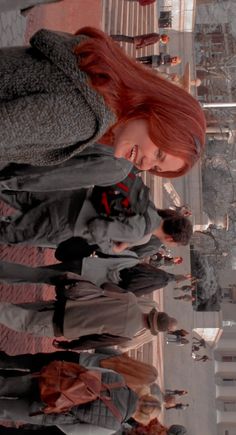 a group of young women standing next to each other