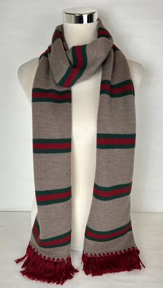 AUTHENTIC BRAND NEW GUCCI SCARF MADE IN ITALY Features: Measurements: 23cm x 200cm - 9" x 78.7" 100% Wool Comes with tag Made In Italy Please keep in mind that measurements are provided only as a guide and are approximate. Sizes listed are based on the item label. Item fit and sizing can vary by Manufacturer.  Color appearance may vary depending on your monitor settings. Payment: International buyers are welcome! (Please Note: Import duties, taxes and charges are not included in the item price or shipping charges. These charges are the buyer's responsibility) We will keep on listing more and more amazing authentic name brand products. Please check out our other items! And be sure to add us to your favorites list! Gucci Stripe, Item Label, Stripe Scarf, Gucci Scarf, Favorites List, Long Scarf, Keep On, Favorite Things List, Light Brown