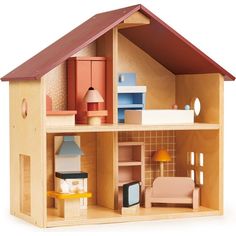 a wooden doll house with furniture and accessories