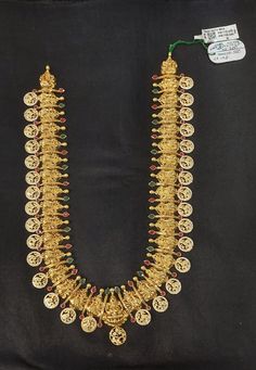 22 Karat Gold 'Lakshmi - Peacock' Long Necklace with Cz & Color Stones (Temple Jewellery)     - 235-GN4895 - in 104.700 Grams for USD $8278.29. 
Made in India by Totaram Jewelers Online this product is in Gold - 22 Karat BIS Hallmark 916 KDM Gold  & is an excellent gift for Adult - Women. Ships fully insured with secured guaranteed delivery for free with your order over $250 from New Jersey USA & comes with 30 days exchange policy. Gold Kundan Necklace With Peacock Design In Chandbali Shape, Gold Kundan Necklace With Peacock Design For Diwali, Gold Kundan Necklace With Peacock Design, 22k Gold Kundan Necklace With Peacock Design For Puja, Festive Gold Kundan Necklace With Peacock Design, Festive Yellow Gold Kundan Necklace With Peacock Design, Gold Temple Necklace With Peacock Design For Festive Occasions, Gold Temple Necklace With Peacock Design For Festive Season, Gold Temple Necklace With Peacock Design For Festivals