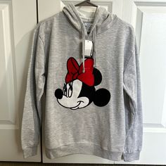 Nwt Minnie Mouse Sweatshirt. Never Worn Cute Minnie Mouse Tops For Fall, Casual Mickey Mouse Tops For Winter, Casual Minnie Mouse Long Sleeve Sweatshirt, Casual Long Sleeve Minnie Mouse Sweatshirt, Cute Hooded Mickey Mouse Top, Casual Minnie Mouse Sweatshirt For Winter, Casual Minnie Mouse Tops For Winter, Cute Mickey Mouse Hoodie For Winter, Cute Mickey Mouse Cotton Hoodie