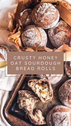 some bread rolls are sitting on a tray with the words crusty honey oat sourdough bread rolls