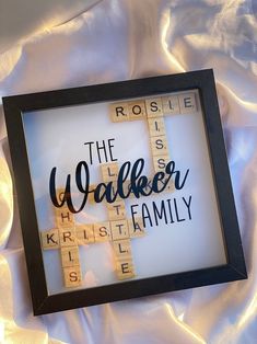 a scrabble frame with the words'the walker family '