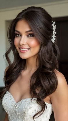 a woman in a wedding dress with long hair