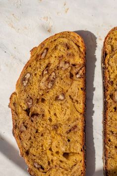 two slices of bread sitting on top of a table