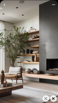 a living room filled with lots of furniture and a tree in the middle of it