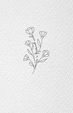 a drawing of flowers on paper with the word love written in black and white ink