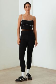 Elevate your boutique's activewear collection with our Chic Contrast Trim Ribbed Workout Set! This stylish two-piece ensemble combines fashion-forward design with functional comfort, perfect for the modern woman who demands both style and performance from her workout gear. 🖤 Complete the look: Layer with an oversized hoodie for a trendy athleisure outfit Pair the crop top with high-waisted jeans for a casual day look Add a lightweight jacket for a put-together post-gym ensemble 🖤 Features: Rib Trendy Gym Activewear With Built-in Bra, Stretch Sports Bra For Loungewear, Seamless Tight Casual Activewear, Casual Seamless Tight Activewear, Trendy High Waist Activewear For Loungewear, High Waist Sportswear For Loungewear, Trendy Tight Workout Activewear, Trendy High Waist Loungewear Activewear, Trendy High-waist Loungewear Activewear