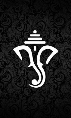 the hindu symbol for ganesha on a black background with swirls and leaves