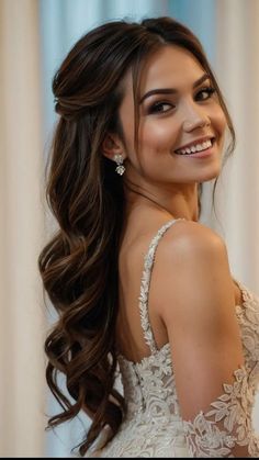 a woman with long hair wearing a wedding dress