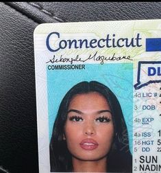 a driver's id card with an image of a woman